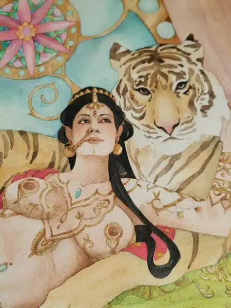 Un plan rapproché sur le visage de la belle Ganikâ, avec les bijoux en or en cours de peinture.